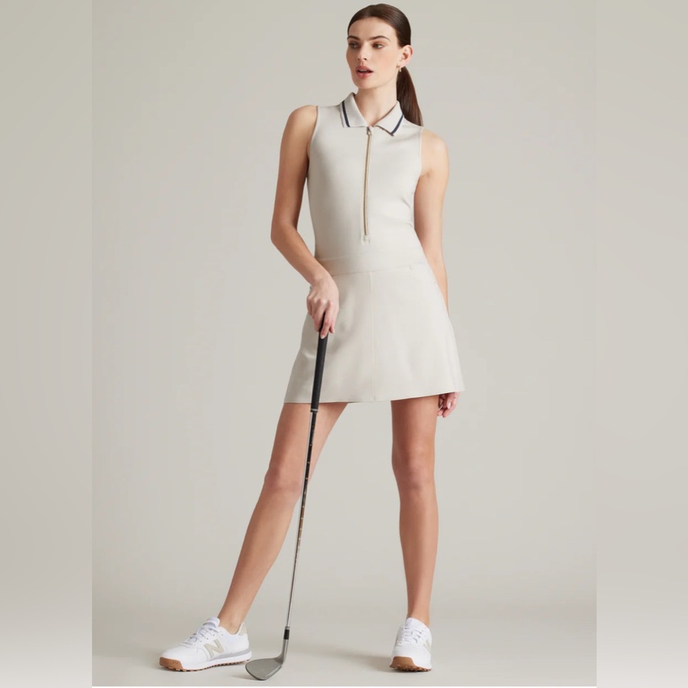 RHONE Sleeveless Polo Mini Dress in Light Beige with Navy Trim